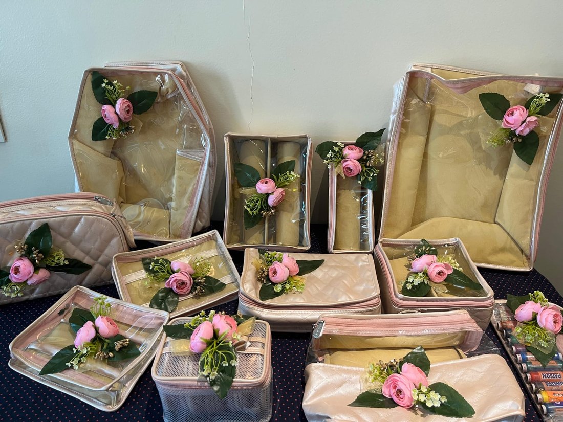 Pink quilted trousseau packing bags and pouches